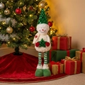 Détail d'un bonhomme de neige de Noël à paillettes sur un tapis de sapin en velours - Petit Bonhomme de Neige à Paillettes Vertes
