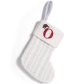 White knitted Christmas stocking with red letter O embroidery and festive santa hat detail - Letter O