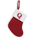 Red knit Christmas stocking featuring a white cuff with an embroidered letter Q design - Letter Q