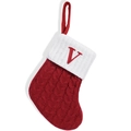 Red knit Christmas stocking with white cuff and red embroidered letter V detail - Letter V
