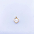 Detail of a heart-shaped pendant with white mother of pearl and gold-plated metal frame - 18K Gold Tone Flat White Shell Large Heart