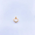 Close-up of heart pendant with gold copper frame and white mother of pearl inlay - 18K Gold Tone Convex White Shell Small Heart