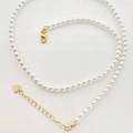 Detailed view of elegant white pearl necklace featuring gold lobster clasp and heart pendant - 4mm Glass Bead Chain Only (Without Pendant) / 18K Gold