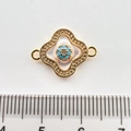 Detailed view of 18k gold plated four-leaf flower connector with turquoise and zircon - Clover Without Diamonds