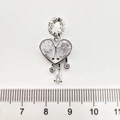 Macro detail of silver heart charm with pear-cut cubic zirconia and dangling stones - Heart Waterdrop White Gold