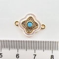Detailed view of 18k gold plated floral connector charm with turquoise center and crystals - Full Diamond Clover