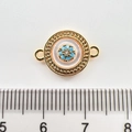 Macro view of 18k gold plated round pendant with turquoise beads and zircon floral detail - Round Without Diamonds