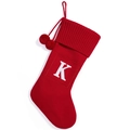 Red knit Christmas stocking with white letter K embroidery and soft pom-poms - Red K