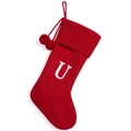 Red knitted Christmas stocking with white embroidered letter U and decorative pompoms - Red U