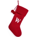 Red knitted Christmas stocking with white letter W embroidery and pom poms - Red W
