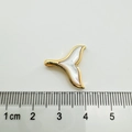Close-up of a 1.5cm 18K gold plated whale tail pendant inlaid with natural white shell - Mermaid Skirt