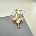 Macro detail of gold-plated butterfly pendant with iridescent shell inlay and zircons - White Shell Style / Pendant White Mother of Pearl