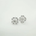Detailed macro view of geometric zircon earring setting with 18K gold plated finish - Silver Stud Earrings