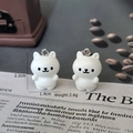 Detail view of white resin bear charms showing dimensions of 2.2cm by 1.4cm for jewelry DIY - White Cat Shape