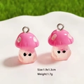 Close-up of pink resin mushroom pendants with white polka dots and size dimensions - Pink Mushroom
