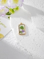 Detail of rectangular resin pendant with purple dried flowers and gold leaf accents - 5 Green Purple Floral