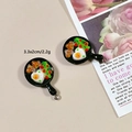 Macro view of miniature resin frying pan charm with heart egg and bacon details - Heart Egg Pan