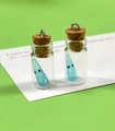 Luminous blue ghost in glass bottle charm with cork stopper for DIY jewelry projects - Blue Ghost Bottle