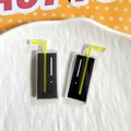 Detailed view of acrylic creative drink pendants with black box and yellow straws - Soda With Straw