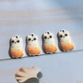 Detailed view of four orange tabby cat alloy charms with smooth enamel finish for DIY crafts - Orange Cat / AN110