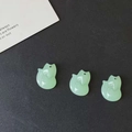 Tre ciondoli a forma di volpe in resina verde chiaro con consistenza di giada per DIY - Volpe