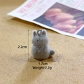 Close-up of grey flocked rabbit charm with size dimensions on wooden background - MR121 / Gray Cat