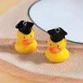 Cute yellow resin swimming duck pendant with black doctoral cap and metal ring for DIY - Doctor Duck