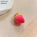 Detailed macro view of a 2x1.3cm pink strawberry resin pendant with metal ring loop - Gradient Strawberry