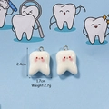 Pair of creative tooth resin charms for DIY jewelry making with cute facial expressions - Shy Tooth Expression (AC85)