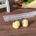 Close-up of yellow flocked duckling charms with silver rings for DIY accessories - Large Duck