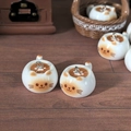 Macro shot of 3D miniature resin cat coffee cup charms with metal rings for DIY jewelry making - 3D Cat Coffee Cup Style (AC146) / Cat Coffee