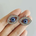 Colgante de ojo turco plateado con cristales para creación de joyas artesanales - Ojo Plateado con Encaje