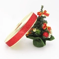 Close-up of sparkling red glitter ribbon with gold edges on a mini Christmas tree - 3.8CM / Red