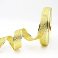 Dettaglio del nastro natalizio dorato glitterato con bordi goffrati su fondo bianco - Larghezza 3,8 cm Oro
