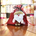 Christmas burlap gift bag with 3D Santa Claus figure, bells, and drawstring closure - 18x19cm / Santa Claus