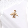 Minimalist golden airplane charm for DIY jewelry making on white textured stone - Gold Airplane