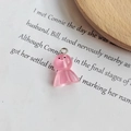 Pendentif bonhomme de neige rose translucide en résine avec un petit visage souriant - Rose rouge