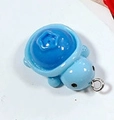 Blueberry style resin turtle pendant with light blue body and dark blue textured shell - Blueberry Turtle