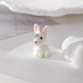 Macro shot of a flocked bull terrier animal charm with a soft texture for DIY jewelry - Bull Terrier