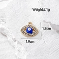Vista dettagliata del ciondolo malocchio con dimensioni, strass e smalto blu - Ovale Occhio Blu Base Oro (AN57)