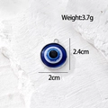 Vista dettagliata del ciondolo cuore malocchio con peso di 3.7g e altezza di 2.4cm - Smalto Tondo Argento (B Argento_AN07)