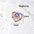 Macro del ciondolo a cuore dorato con ciondoli malocchio e strass scintillanti - Cuore Multi-occhio Oro (N Blu Scuro_AN18)