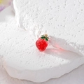 Detail of red strawberry fruit charm with green leaves and golden metal hanging ring - Transparent Red Strawberry