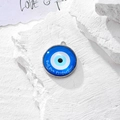 Ciondolo protettivo malocchio blu con base argentata e scritte incise in metallo - Stile Slogan di Protezione (3)