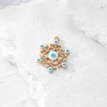 Ciondolo a fiocco di neve dorato con occhio greco, smalto blu e strass - Fiocco di Neve in Strass Oro (F_AN18)