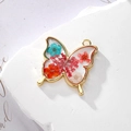 Alloy butterfly pendant with colorful natural dried flowers and clear resin fill - Red Gypsophila Butterfly