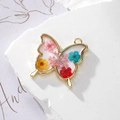 Artistic golden butterfly pendant with colorful dried flowers on white stone base - Pink Gypsophila Butterfly