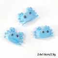 Close-up of light blue glass crab charms with dimensions 2.4x1.6cm for DIY jewelry making - Solid Sky Blue Crab
