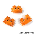 Three orange glass crab charms with dimensions 2.5x1.6cm for DIY jewelry making - Orange Crab