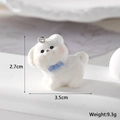White flocked puppy charm with blue bowknot and metal ring for DIY keychains - Tilting Head Dog